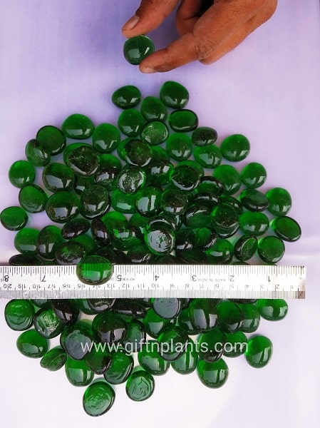 Decorative glass pebbles are used for crafts, flower vases and plants' decoration.